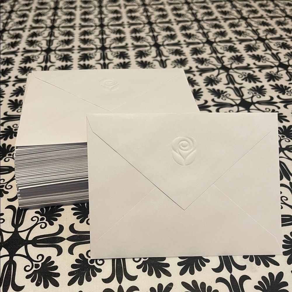 Carlton Cards - 100 flower embossed white envelops 5.25in x 4in